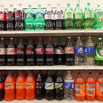 NEW YORK, NY - MAY 31: Two-liter bottles of regular and diet soda are seen for sale at a Manhattan store on May 31, 2012 in New York City. New York City Mayor Michael Bloomberg is proposing a ban on sodas and sugary drinks that are more than 16 ounces in an effort to combat obesity. Diet sodas would not be covered by the ban and many grocery stores would be exempt. (Photo by Mario Tama/Getty Images)