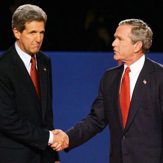 U.S. President George W. Bush (R) and Democratic presidential candidate Sen. John Kerry (D-MA) shake hands before the start of a debate