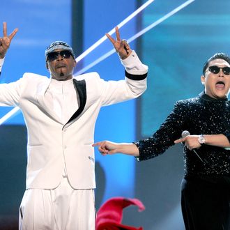 (L-R) MC Hammer and singer PSY perform onstage during the 40th American Music Awards held at Nokia Theatre L.A. Live on November 18, 2012 in Los Angeles, California.