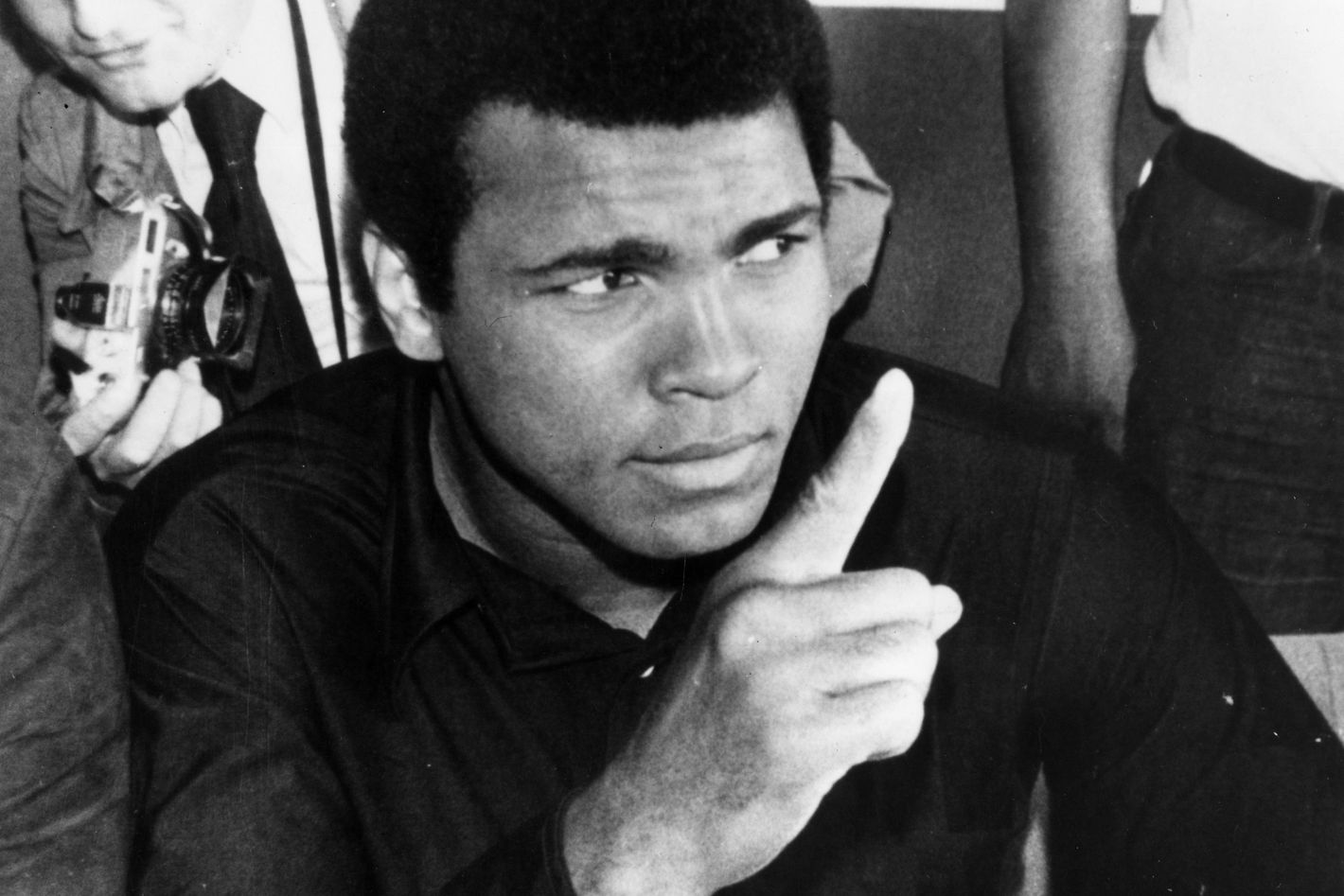 Muhammad Ali quote: I make predictions about what I'm going to do before