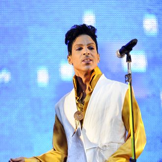 US singer and musician Prince (born Prince Rogers Nelson) performs on stage at the Stade de France in Saint-Denis, outside Paris, on June 30, 2011.