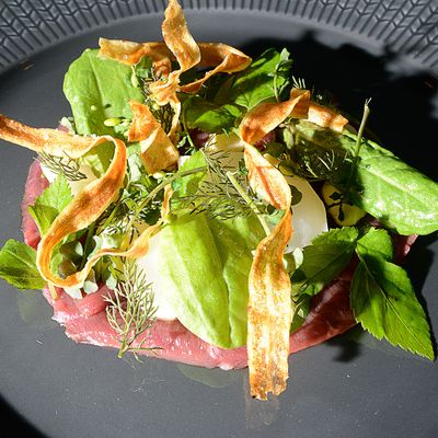 Raw beef heart with pickled onions, salsify mayonnaise, and sumac.