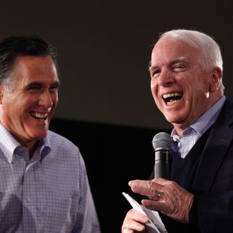 Former presidential nominee, U.S. Sen. John McCain (R-AZ) (R) announced that he is endorsing Republican presidential candidate and former Massachusetts Gov. Mitt Romney during a town hall meeting at Central High School January 4, 2012 in Manchester, New Hampshire. Romney beat former U.S. Senator Rick Santorum by only eight votes in Tuesday's 