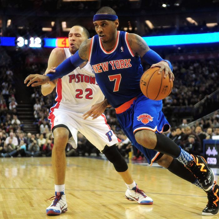 Carmelo Anthony of New York Knicks battles with Tayshaun Prince of Detroit Pistons during the NBA London Live 2013 game between New York Knicks and the Detroit Pistons at the O2 Arena on January 17, 2013 in London, England.