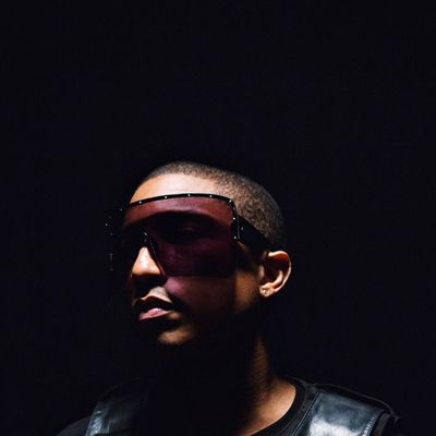 Pharrell's goggle glasses.