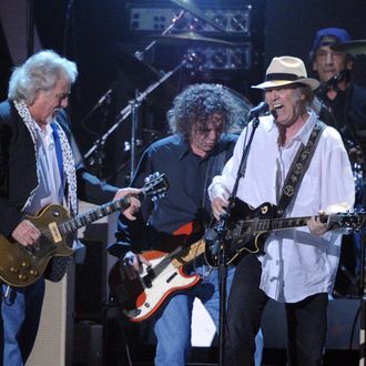 (L-R) Musicians Frank Sampedro, Billy Talbot, Neil Young, and Ralph Molina of the band Crazy Horse perform onstage on February 10, 2012 in Los Angeles, California.