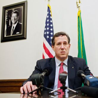 Republican presidential candidate Sen. Rick Santorum speaks to the media February 13, 2012