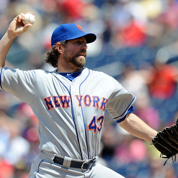 R.A. Dickey #43 of the New York Mets throws a pitch against the Washington Nationals at Nationals Park on June 7, 2012 in Washington, DC.
