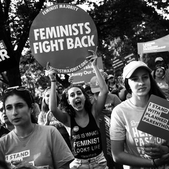 Pro-choice protestors rally against the GOP health care plan.