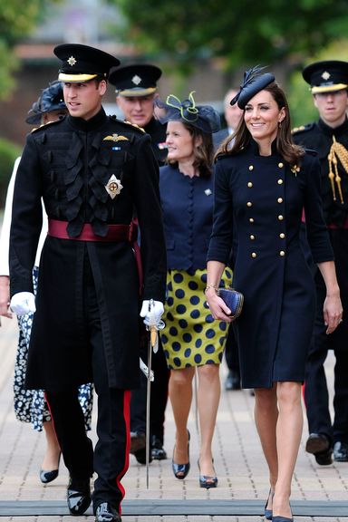 Britain’s Prince William, Duke of Cambridge (L), and his wife the Duchess of Cambridge, Kate (R) walk through Victoria Barracks in Windsor, west of London on June 25, 2011, to attend a medal parade for the 1st Battalion Irish Guards Regiment.    AFP PHOTO / CARL COURT (Photo credit should read CARL COURT/AFP/Getty Images)