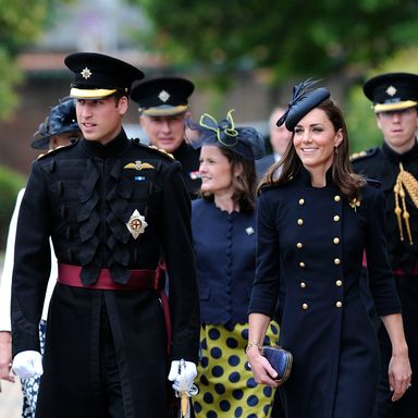 Britain’s Prince William, Duke of Cambridge (L), and his wife the Duchess of Cambridge, Kate (R) walk through Victoria Barracks in Windsor, west of London on June 25, 2011, to attend a medal parade for the 1st Battalion Irish Guards Regiment.    AFP PHOTO / CARL COURT (Photo credit should read CARL COURT/AFP/Getty Images)