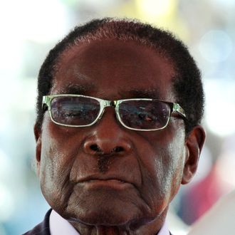 Zimbabwean President Robert Mugabe looks on during his inauguration ceremony in Harare on August 22, 2013 at the National 60,000-seat sports stadium. Veteran leader Robert Mugabe was sworn in as Zimbabwe's president for another five-year term before a stadium packed with thousands of jubilant supporters on August 22. The swearing-in had been delayed after opposition leader Morgan Tsvangirai challenged the election results in a petition to the constitutional court and then later withdrew it. 