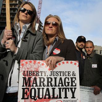 SAN FRANCISCO, CA - JUNE 13: (L-R) Same-sex couples Kate Baldridge, Elizabeth Chase, Joe Alfano and Frank Capley look on during a demonstration outside of the Phillip Burton Federal Building on June 13, 2011 in San Francisco, California. Sponsors of Proposition 8, a California ballot measure that would deny same-sex couples to marry in the state, are back in court today to ask a federal judge to nullify U.S. District Judge Vaughn Walker's decision to overturn California's ban on same-sex marriage. (Photo by Justin Sullivan/Getty Images)