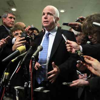 U.S. Sen. John McCain (R-AZ) speaks to members of the media after a hearing on the Benghazi attack before the Select Committee on Intelligence November 16, 2012 on Capitol Hill in Washington, DC. Former Central Intelligence Agency (CIA) Director David Petraeus testified before the committee about the September 11 attacks on the American diplomatic compound in Benghazi, Libya, that killed Ambassador Christopher Stevens and three other Americans.