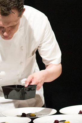 Tranquility as Chef Laiskonis gently plates his sour cherry spheres.