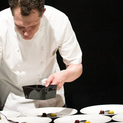 Tranquility as Chef Laiskonis gently plates his sour cherry spheres.