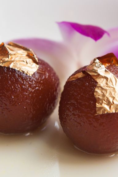 Gulab jamun: Indian doughnuts in a sweet syrup.