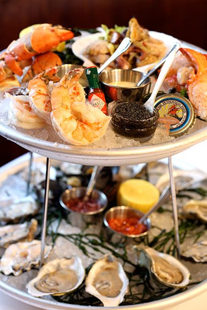 Plateau de mer, with jumbo tiger prawns, osetra caviar service, Jonah crab claws, lobster, oysters, ceviche, and clams.