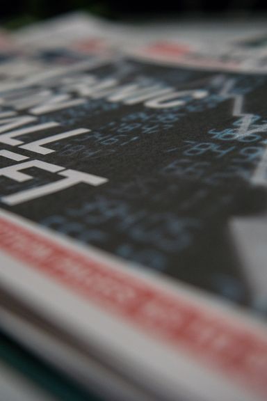 On the prop table: a newspaper, read in the spot by a subway commuter, captures the devastating stock market crash of 2002.