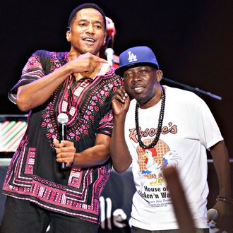 Phife Dawg (R) and Q-Tip of A Tribe Called Quest perform in Los Angeles on August 17, 2013 in Los Angeles, California.