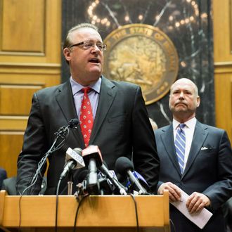 INDIANAPOLIS, IN - APRIL 2: Indiana Senate President Pro Tem David Long speaks as House Speaker Brian Bosma (R) looks on during a press conference about anti-discrimination safeguards added to the controversial Religious Freedom Restoration Act at the State Capitol April, 2, 2015 in Indianapolis, Indiana. The bill prompted a swift backlash nationwide with businesses and entertainers promising to boycott the state. (Photo by Aaron P. Bernstein/Getty Images)