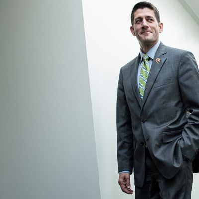 Rep. Paul Ryan (R-WI) walks to a meeting with House Republicans on Capitol Hill October 16, 2013 in Washington, DC. House Republicans are meeting after Senate Democrat and Republican leadership agreed on a compromise to reopen the US federal government funding it to mid January address the debt limit till early February. 