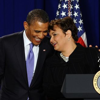 US President Barack Obama (L) listens to Environmental Protection Agency (EPA) administrator Lisa Jackson before speaking to EPA employees in Washington, DC, on January 10, 2012.