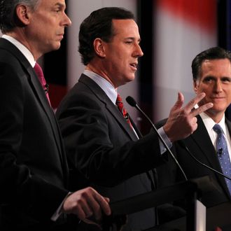 CONCORD, NH - JANUARY 08: Republican presidential candidates, (L-R) former Utah Gov. Jon Huntsman, former U.S. Sen. Rick Santorum, and former Massachusetts Gov. Mitt Romney participate during the NBC News Facebook Debate on 'Meet the Press' January 8, 2012 at the Capitol Center for the Arts in Concord, New Hampshire. The candidates participated in the last debate before the primary election on Tuesday. (Photo by Alex Wong/Getty Images)