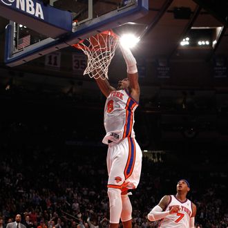 J.R. Smith #8 of the New York Knicks dunks in the first half against the Miami Heat in Game Three of the Eastern Conference Quarterfinals in the 2012 NBA Playoffs on May 3, 2012 at Madison Square Garden in New York City.