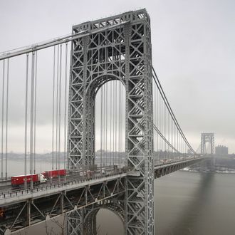 Traffic moves over the Hudson River and across the George Washington Bridge between New York City and in Fort Lee, New Jersey on December 17, 2013.