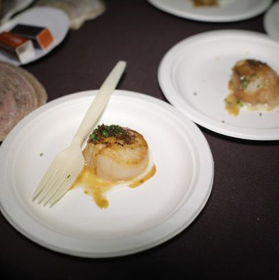 Sirio Ristorante's seared scallops with cauliflower purée and black-truffle sauce.