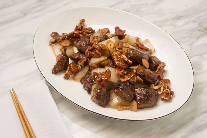 A Madam Zhu's original: beef with black-pepper sauce, walnuts, and garlic chips.