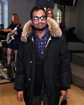 Comedian/ actor Aziz Ansari attends the Chloe Sevigny for Opening Ceremony fall 2013 fashion show during Mercedes-Benz Fashion Week at St. Mark's Church In The Bowery on February 9, 2013 in New York City.