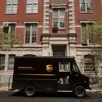 NEW YORK - APRIL 23: A UPS delivery truck sits parked on a street in Manhattan April 23, 2009 in New York City. United Parcel Service reported first-quarter earnings dropped sharply admist the global economic downturn and a dwindling shipping demand. (Photo by Chris Hondros/Getty Images)