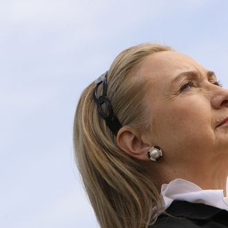 U.S. Secretary of State Hillary Clinton stand to attention during wreath laying ceremony at Kings Park on November 14, 2012 in Perth, Australia. The bilateral AUSMIN forum will focus on foreign, defence and strategic policy and will be held in Perth today.