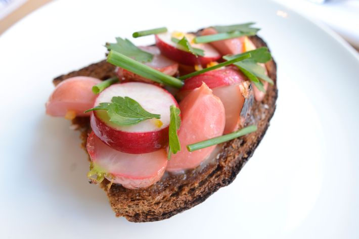 Radishes and Teleme cheese on pumpernickel.