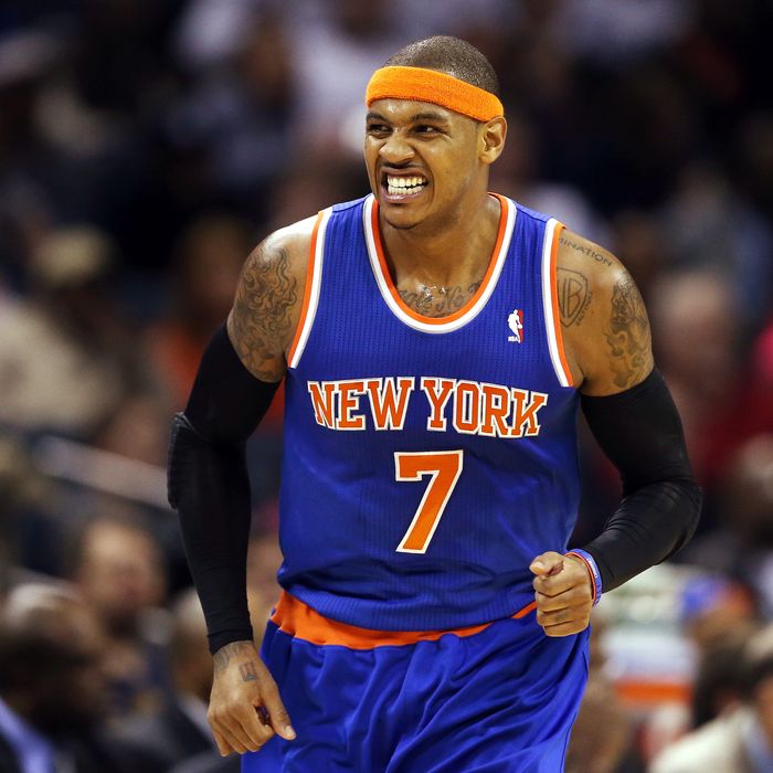 Carmelo Anthony #7 of the New York Knicks reacts after making a basket.
