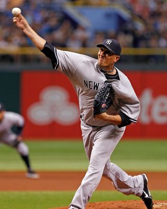 Pitcher Freddy Garcia #36 of the New York Yankees pitches against the Tampa Bay Rays during the game at Tropicana Field on July 2, 2012 in St. Petersburg, Florida.
