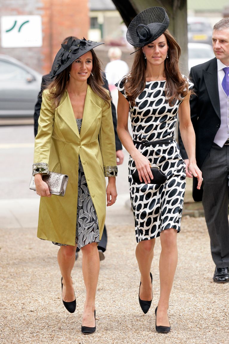 LAMBOURN, UNITED KINGDOM - JUNE 11: (EMBARGOED FOR PUBLICATION IN UK NEWSPAPERS UNTIL 48 HOURS AFTER CREATE DATE AND TIME) Pippa Middleton and Catherine Duchess of Cambridge attend the wedding of Sam Waley-Cohen and Annabel Ballin at St. Michael and All Angels church on June 11, 2011 in Lambourn, England. (Photo by Indigo/Getty Images)