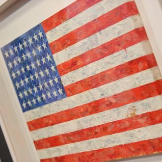 Jasper Johns' 'Flag', 1960-66, estimated at USD 10 million to 15 million, on display May 7, 2010 at Christie's in New York. The work belongs to the collection of Michael Chrichton, to be sold at the Post-War and Contemporary art evening sale at Christie's May 11. AFP PHOTO/Stan Honda (Photo credit should read STAN HONDA/AFP/Getty Images)