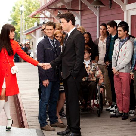 GLEE: Rachel (Lea Michele, L) says goodbye to Finn (Cory Monteith, third from L) and the rest of the glee club as she heads to New York in the 