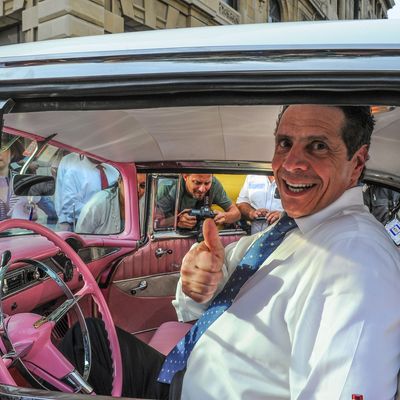 New York Governor Andrew Cuomo sits inside a vintage US car, on April 20, 2015. A delegation of the US state of New York, led by Democrat Governor Cuomo, arrived in Cuba as talks between the two countries continue on trying to re-establish diplomatic ties which have been frozen for five decades. AFP PHOTO /Yamil LAGE (Photo credit should read YAMIL LAGE/AFP/Getty Images)