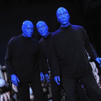 Blue Man Group founders Phil Stanton, Chris Wink and Matt Goldman pose for a photo at the Blue Man Group's 20th anniversary reunion show to benefit The Blue School at the Astor Theater on April 13, 2011 in New York City.