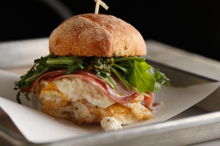 Godmother: Prosciutto, salami, mozzarella, baby arugula, walnut pesto, Pugliese roll.