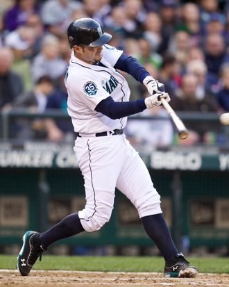 Jesus Montero #63 swings during an at-bat in a game against the Minnesota Twins