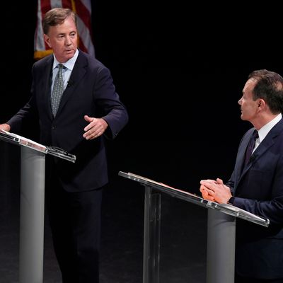 Democratic candidate for governor Ned Lamont, left, debates with Bridgeport Mayor Joe Ganim in New Haven, Conn., . Lamont is the party's endorsed candidate, while Ganim petitioned his way onto the Aug. 14 ballot.