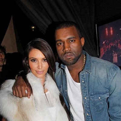 Kim Kardashian and Kanye West attend the Kanye West Ready-To-Wear Fall/Winter 2012 show as part of Paris Fashion Week at Halle Freyssinet on March 6, 2012 in Paris, France.