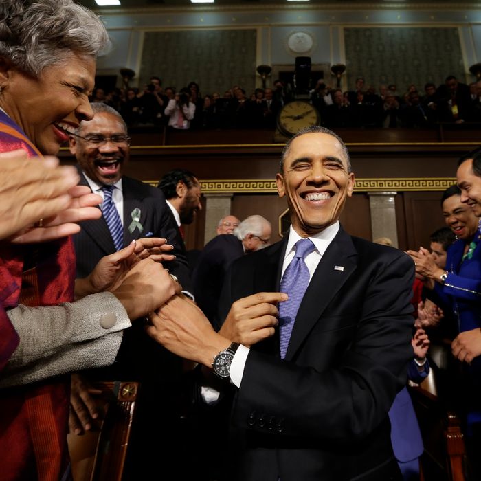 U.S. President Barack Obama is greeted before his State of the Union address during a joint session of Congress on Capitol Hill on February 12, 2013 in Washington, D.C. Facing a divided Congress, Obama is expected to focus his speech on new initiatives designed to stimulate the U.S. economy. 