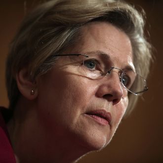 U.S. Sen. Elizabeth Warren (D-MA) listens during a hearing before the Senate Banking, Housing and Urban Affairs Committee May 21, 2013 on Capitol Hill in Washington, DC. The committee held a hearing on the Financial Stability Oversight Council's annual report.