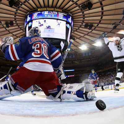 NEW YORK, NY - JUNE 09: Dwight King #74 of the Los Angeles Kings celebrates a goal on Henrik Lundqvist #30 of the New York Rangers by Jeff Carter #77 of the Los Angeles Kings during the first period of Game Three of the 2014 NHL Stanley Cup Final at Madison Square Garden on June 9, 2014 in New York, New York. (Photo by Bruce Bennett/Getty Images)